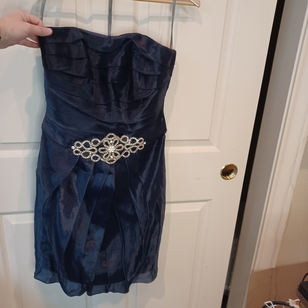 Vera Wang size 8 navy bridesmaid dress with rhinestone accent.